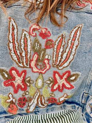 Full sleeve with hand beading and embroidery on medium wash denim jacket