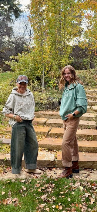 Get Lost hoodie in Soft Stone with Off the Cuff barrel leg pants, next to the Unbroken Moose hoodie in Alpine Lake