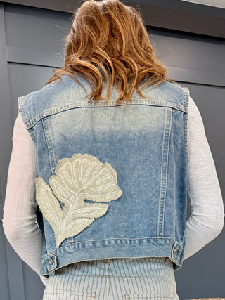 Back of the Free Fallin' Flower Quilted Patchwork Denim Vest showing the quilted floral patchwork
