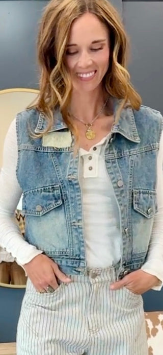 Front close-up of the Free Fallin' Flower Quilted Patchwork Denim Vest in vintage wash